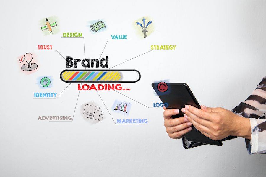 Online Brand and Reputation Management SEO reputation management Woman holds tablet whilst brand is loading